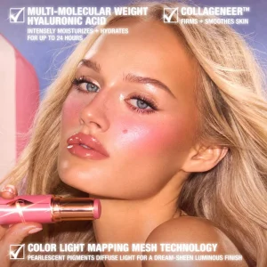 Charlotte Tilbury Unreal Lip + Cheek Glow Blush Stick with Hyaluronic Acid - Rosy Glow yonoq va lablar uchun stik-krem rumyana